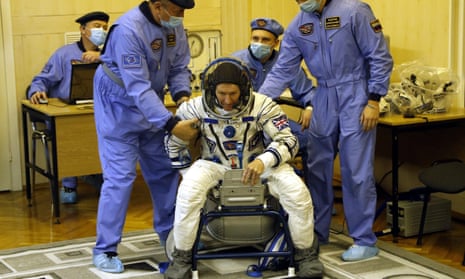 Tim Peake tests a space suit, during the pre-launch preparations at the Baikonur cosmodrome in Kazakhstan on December 15