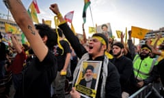 Supporters of Iran-backed Hezbollah chant slogans in Beirut.