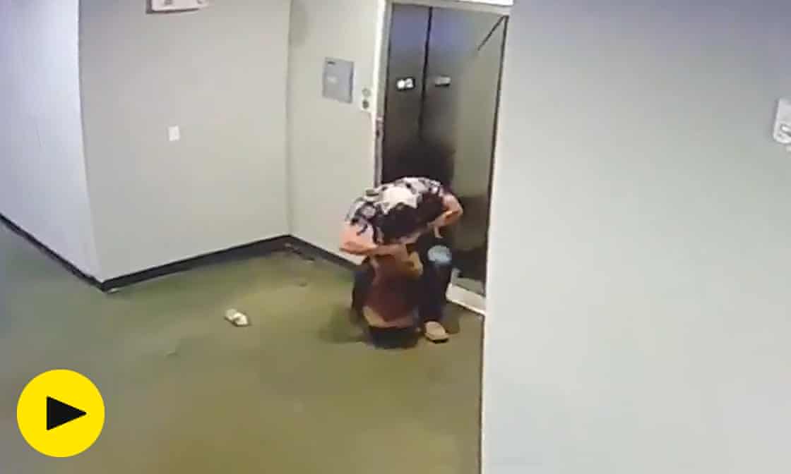 Man saves dog after leash gets caught in elevator door – video