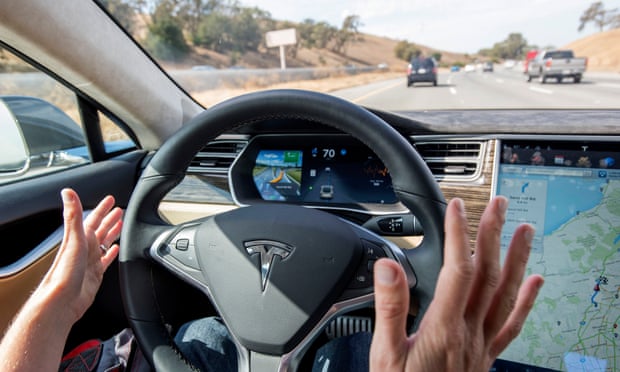 The interior of a Tesla Model S car equipped with autopilot.