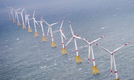 Row of wind turbines in North Sea.
