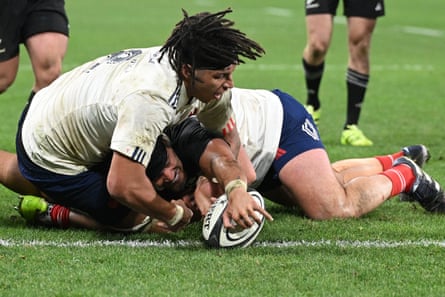 Billy Proctor stretches to score a try for New Zealand against France before it was cancelled out