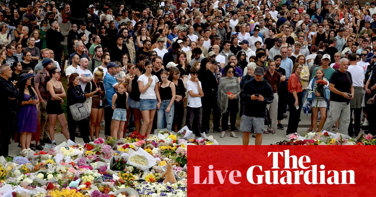 Bondi beach shooting live updates: national cabinet vows ‘strong, decisive and focused’ action on gun laws; mourners leave floral tributes at site of attack