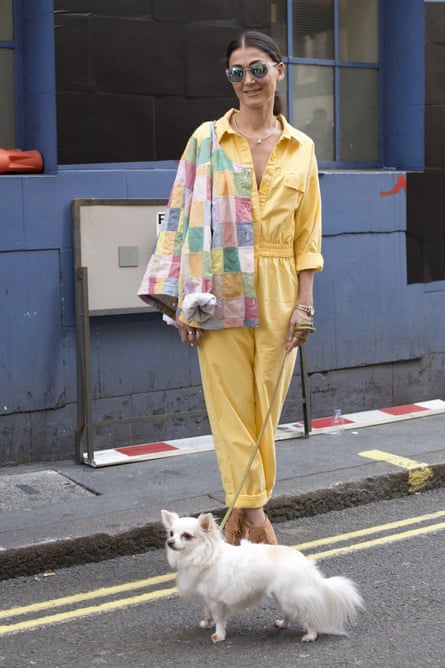 Fashion stylist Lina Matluma wearing a vintage jumpsuit during London Fashion Week spring/summer 2016/17.
