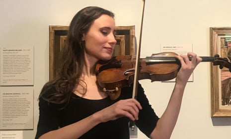 Jennifer Pike performs beneath a portrait (click to view full image) of Vaughan Williams in the National Portrait Gallery in London.