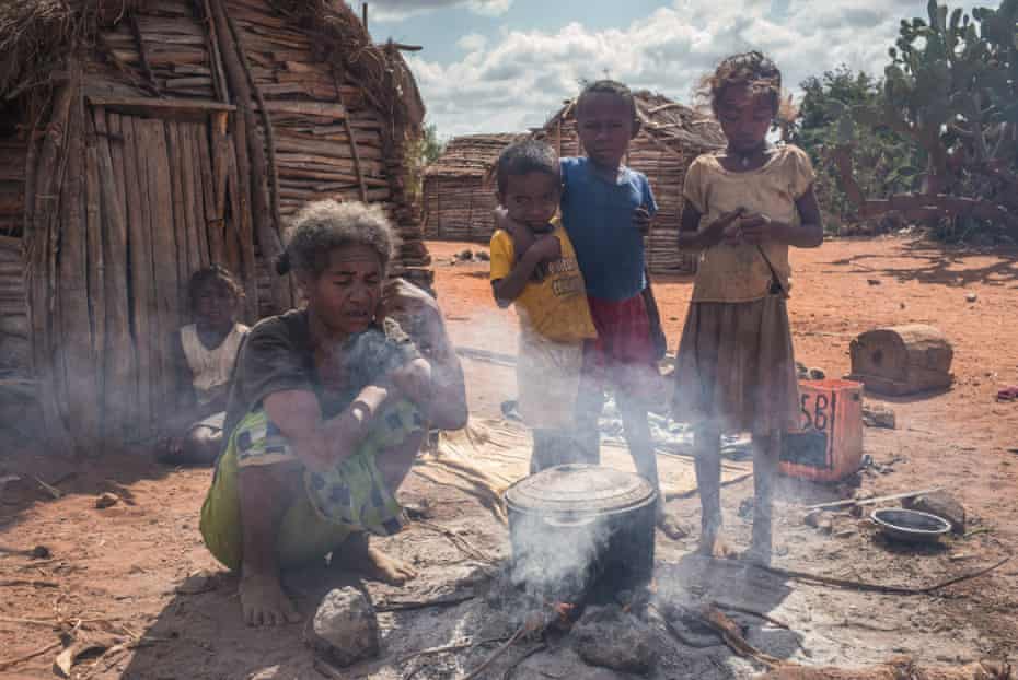 Helmine Monique Sija, about 50 years old, prepares raketa (cactus) to eat with her daughter Tolie, 10 years old, in the village of Atoby, commune of Behara, Madagascar on August 30, 2021