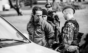 A ‘foreign national’ is detained at a checkpoint during the Halat Hisar larp