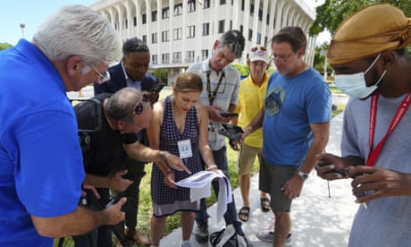 Journalists outside the Paul S Rogers Federal Building and US Courthouse in downtown West Palm Beach as the document is released.