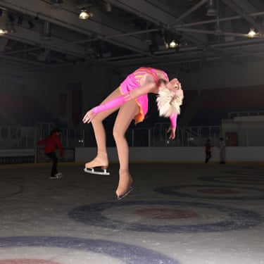 A female skater in a pink and orange outfit is mid-air in a jump, with her head flung back towards the floor behind her