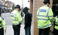 police perform a stop and search in harrow