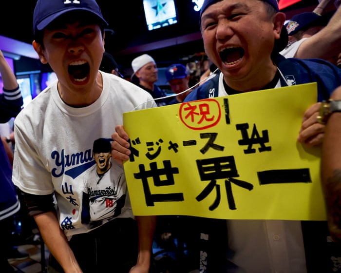 Baseball fans around world react to LA Dodgers’ epic World Series win – in pictures