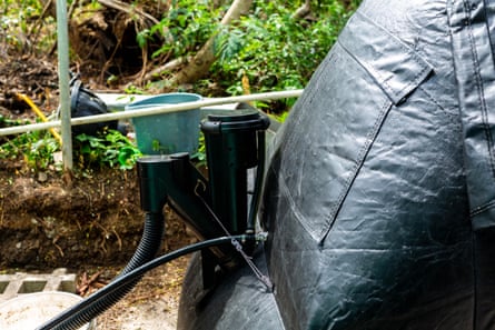 Close-up of the biogas digester, with pipes and valves