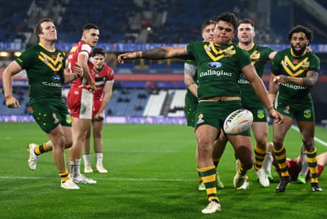 Latrell Mitchell of Australia celebrates after scoring his team's fourth try.
