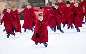 Choristers on an ice rink at Winchester Cathedral, England