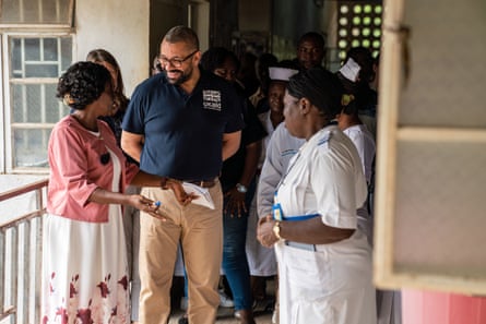 James Cleverly talking to staff at the Bo government hospital in Sierra Leone.