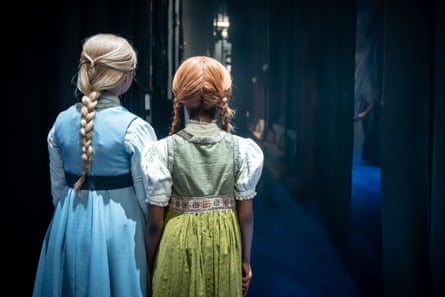 Scandinavian-inspired costumes for Elsa and Anna.