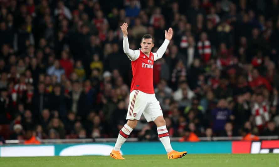 Granit Xhaka reacts to boos from Arsenal supporters as he is substituted against Crystal Palace in 2019.