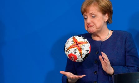 Angela Merkel with a handball