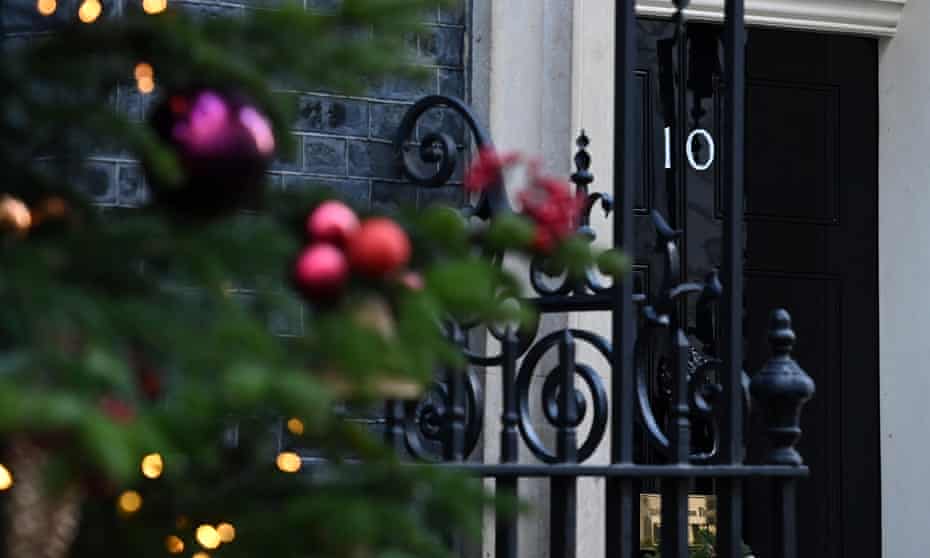 A decorated Christmas tree stands in front of 10 Downing Street in December 2020. 