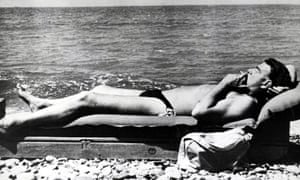 Cambridge-educated Russian spy Guy Burgess relaxes on the shores of the Black Sea. Photograph: Popperfoto/Getty Images