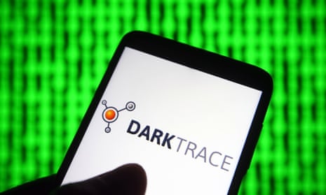Darktrace logo on a smartphone