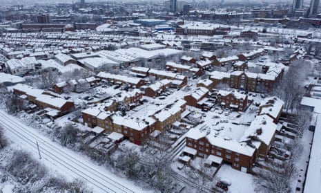 Houses and roads covered with snow in north London on Monday, December 12, 2022, following heavy overnight snowfall.