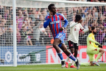 Eddie Nketiah points to his ear after scoring the winning goal during at the Premier League match between Crystal Palace and Liverpool