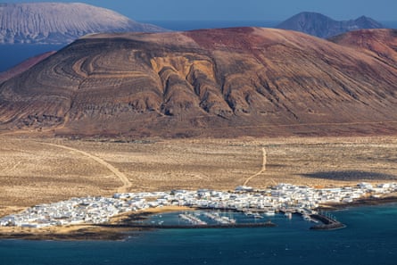 Volcanic island and white town viewed from a high point