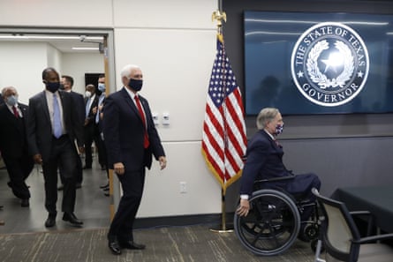 Greg Abbott, right, is followed by Vice-President Mike Pence and housing secretary Ben Carson as they arrive for a news conference last month.