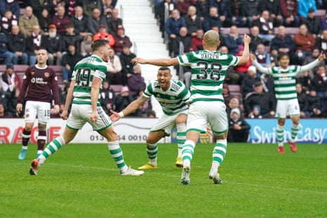 James Forrest and teammates celebrate scoring Celtic’s opener against Hearts at Tynecastle