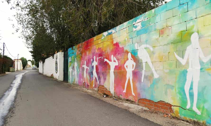 Murals painted by the community with help from local street artists such as Boa Mistura.
