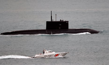 The Krasnodar submarine being escorted by the Turkish coast guard