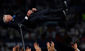 Carlo Ancelotti is thrown in the air by his Real Madrid players after winning the Champions League final against Borussia Dortmund at Wembley.
