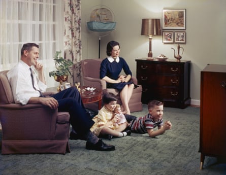 TV Time TogetherA young family watching television together in their lounge, 1957. (Photo by Harold M. Lambert/Getty Images)