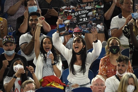 Supporters Nadal react as he wins the fourth set.