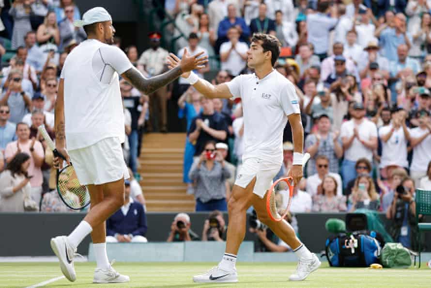 Nick Kyrgios shakes hands with Cristian Garinin after his victory in their men’s singles quarter-final.