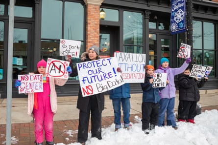people holding signs