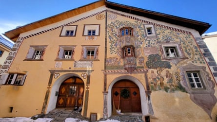 Decorated house facade in Swiss village, using sgraffito