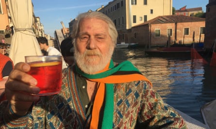 Veteran fan Lorenzo Pedrocco with a drink by canal