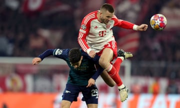 Bayern Munich’s Eric Dier beats Arsenal’s Kai Havertz to a header.