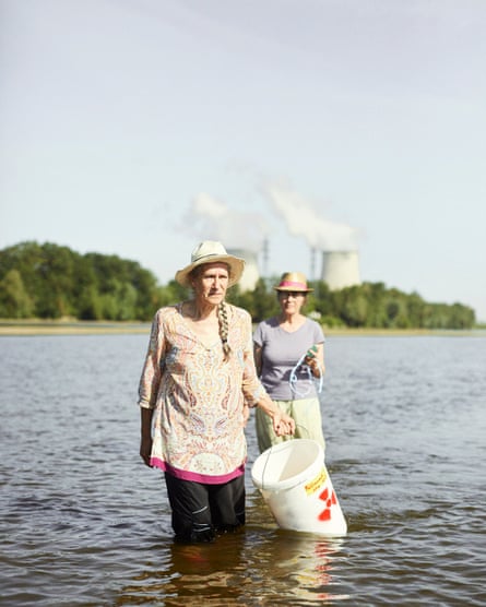 Françoise Pouzet and Bernadette Moreau are members of the Sortir du Nucléaire network. They are taking water samples from the river Loire, near the Belleville plant, to measure radioactivity levels.