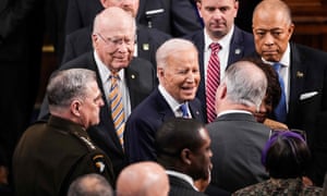 Biden departs after delivering his address.