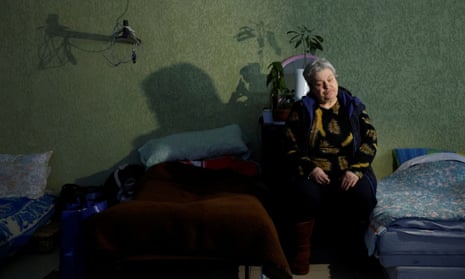 A resident of Soledar waits in temporary sleeping accommodation before being transported to an evacuation train where she will get out in Dnipro, as Russia’s attack on Ukraine continues, in Kramatorsk, Ukraine.
