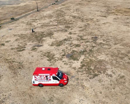 An ice-cream van surrounded by parched grassland at Blackheath Common in London