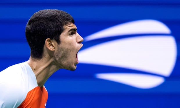 Carlos Alcaraz reacts after a winning a point during his epic quarter-final victory over Jannik Sinner.