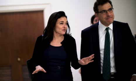 Sheryl Sandberg and Elliot Schrage, the outgoing head of communications and policy, in Washington.
