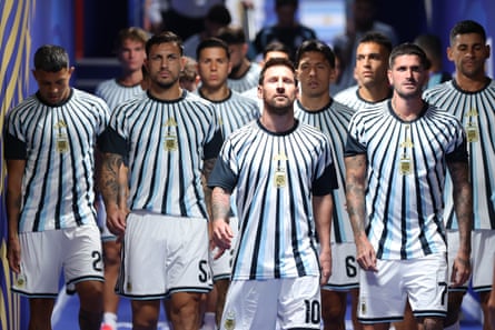 Lionel Messi leads out the Argentina team before their match against Algeria at the World Cup in 2026.