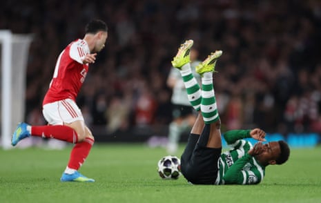 Gabriel Martinelli in action with Sporting CP's Geny Catamo.