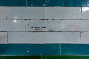 A section of tiled wall at Piccadilly Circus underground station in London