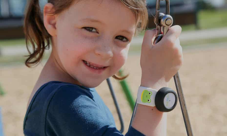 A child is seen wearing the mykidpod.